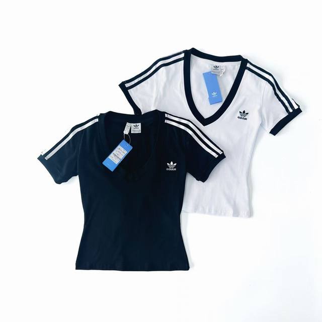 2015 White Background Image. Adidas Three-Leaf Clover Embroidered Women's Short-