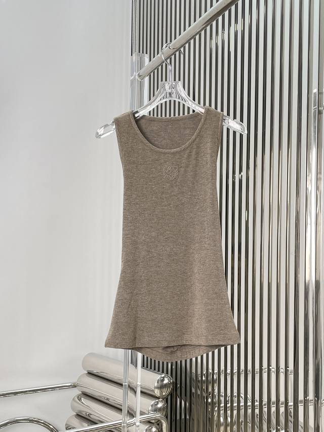 New Arrival! Latest Loe 25New Back Cross-Over Tank Top. Sizes: S, M, L.