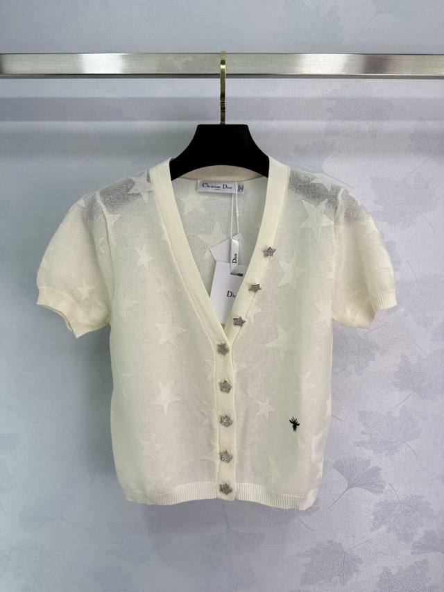 Dio* Knitted Cardigan Evokes A Springtime Fantasy. Delicate Star Patterns Subtly