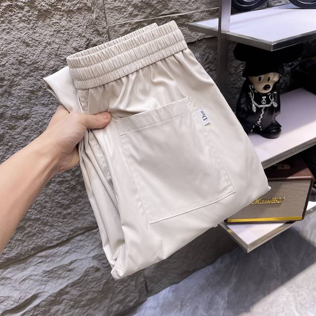 Dior Beige Work Pants A Stylish And Practical Combination. The Beige Color Is Su