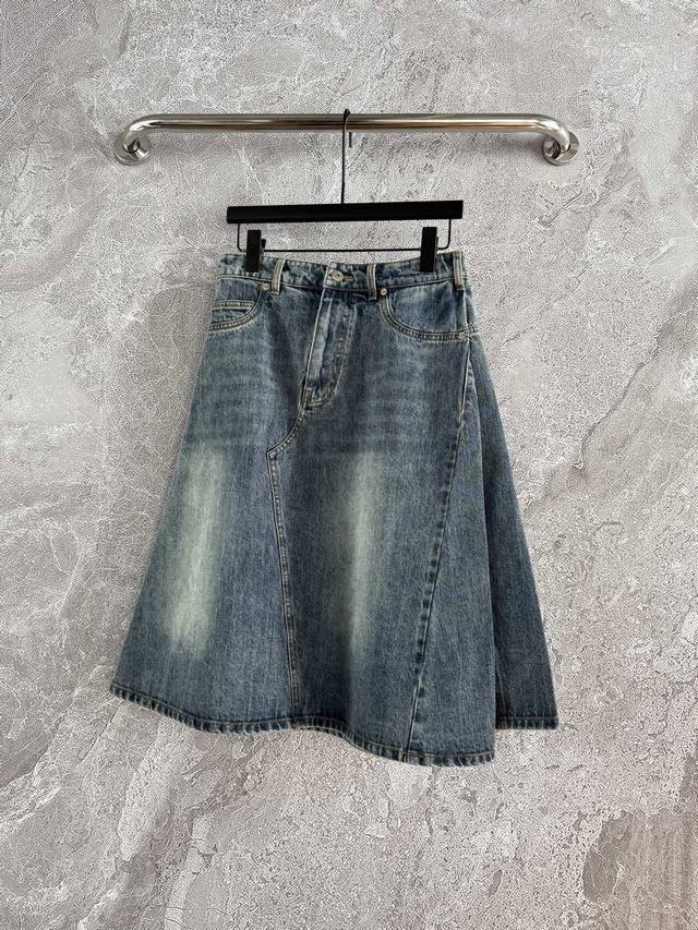 In Stock, Style Number 2P. Asymmetrical Denim Skirt With A Washed Vintage Color