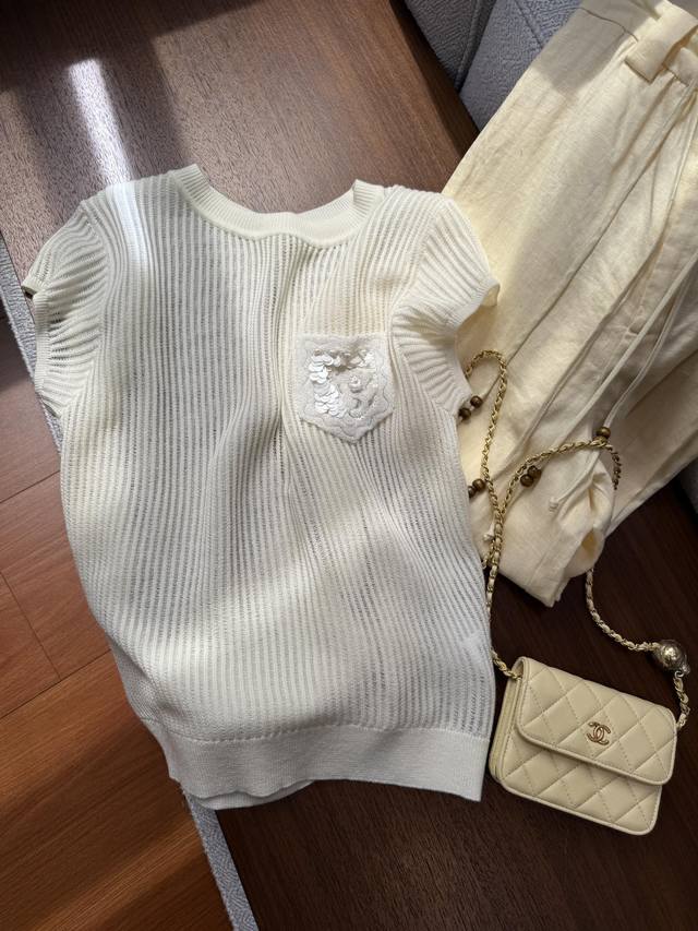 Spring/Summer Update - Lace-Knit Top 35% Wool, 43% Acrylic, 22% Nylon This Summe