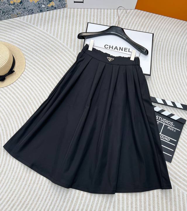 Prada Women's Logo Skirt The Triangle Logo On The Waist. The Dotted Pockets On B
