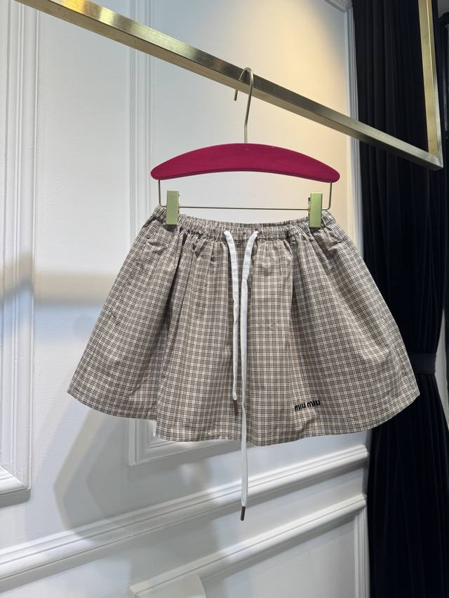 miumiu Checkered Skirt The Checkered Pattern And Silhouette Of This Skirt Are