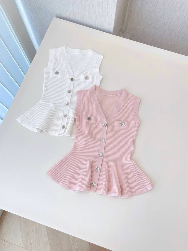 25 New Ysl Sleeveless Knitted Vests Are Available In White And Pink. The V-Ne
