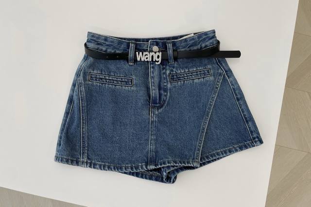 25 New Blue Denim Shorts With A Black Belt. The Belt Has Rhinestones With The