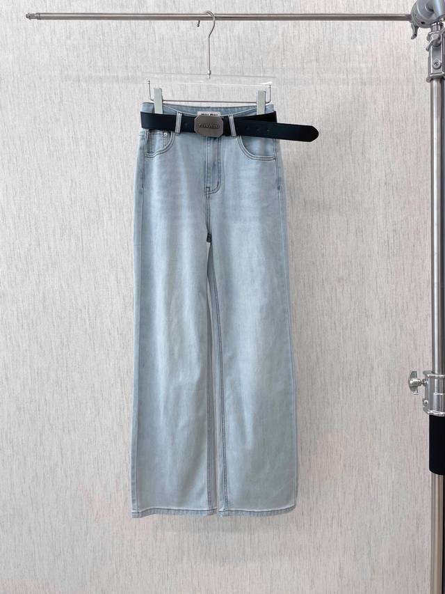 25 New Miumiu Light Blue Wide-Leg Jeans With A Black Belt. Wide-Leg Jeans Are