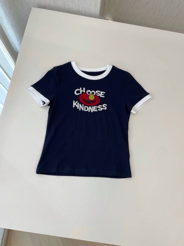 25 New Navy Blue Short-Sleeved Cartoon T-Shirt. The Collar And Cuffs Are Whit
