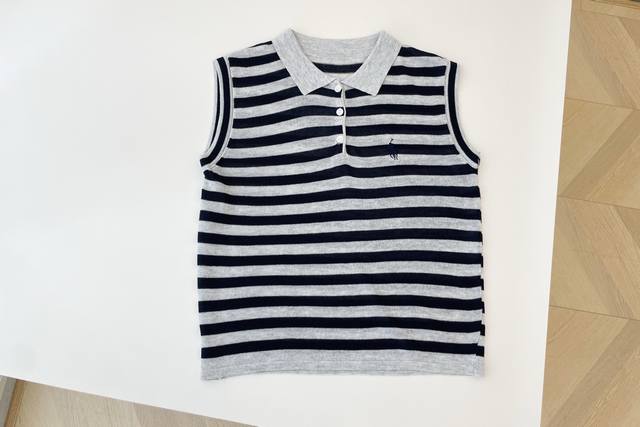 25 New Sleeveless Polo Collar Striped Sweater. The Main Body Is Composed Of B