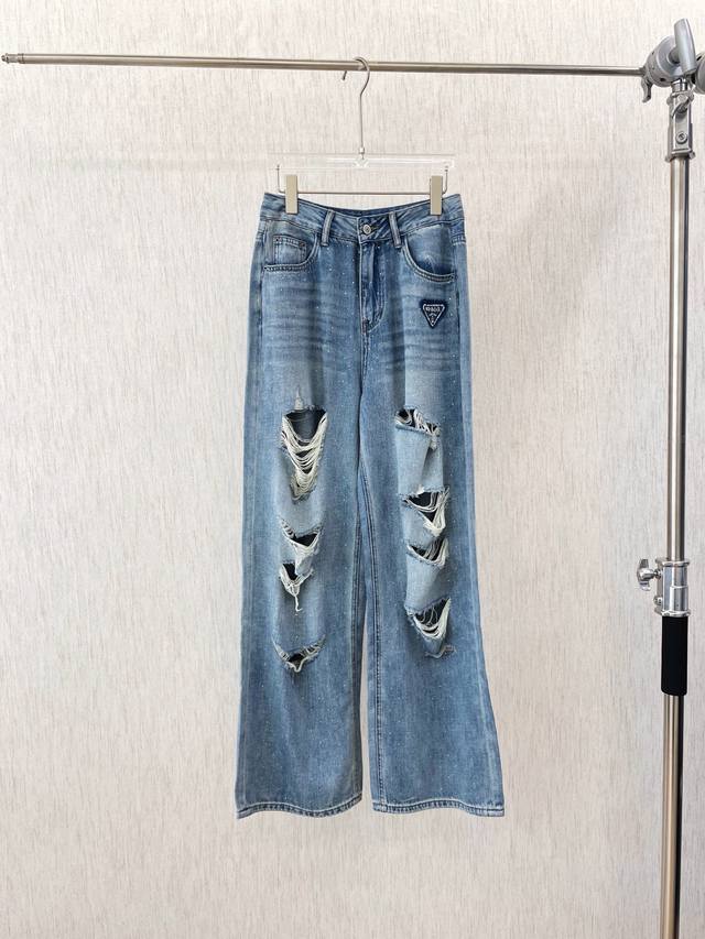 25 New Light Blue Wide-Leg Jeans With Holes There Are Many Irregular Holes On