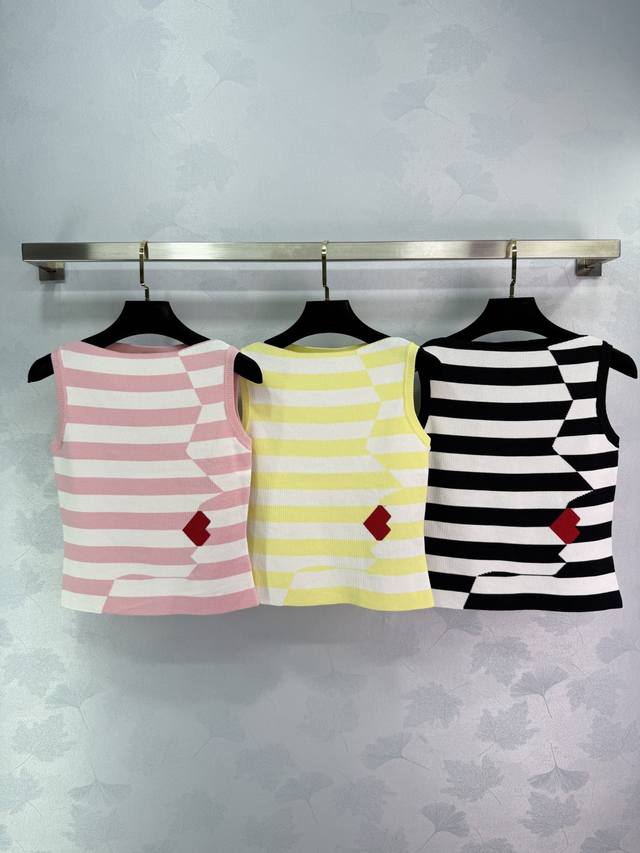 Barr* Sleeveless Knitted Vest In Three Colors: Pink, Yellow And Black. There Is