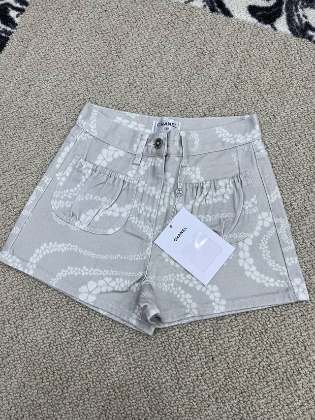 Unlock Chanel Coco Beach Series Denim Shorts To Meet The Fashionable Beachgoers