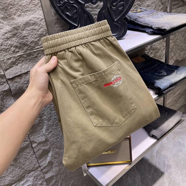 prada Prada Khaki Wide-Leg Overalls Are A Perfect Fusion Of Casualness And Pr