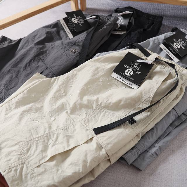Kolon Sport flap multi-pocket loose water-repellent and dirt-resistant shorts Of