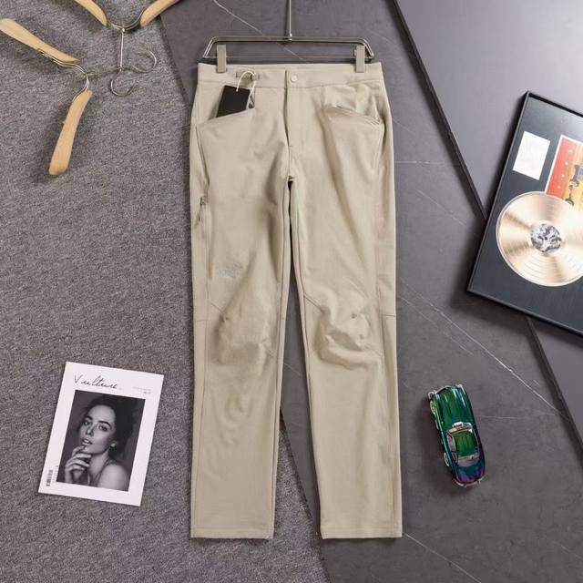 Arc'teryx 3D workwear assault trousers with a large golden logo make you look mo