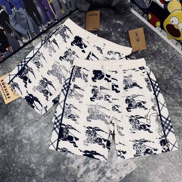 Burberr* Burberry's hot-selling full-print logo shorts are available for both me