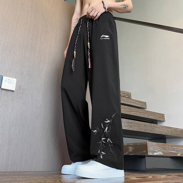 China Li Ning - Lining summer new pure color ice silk pants, men and women's cas