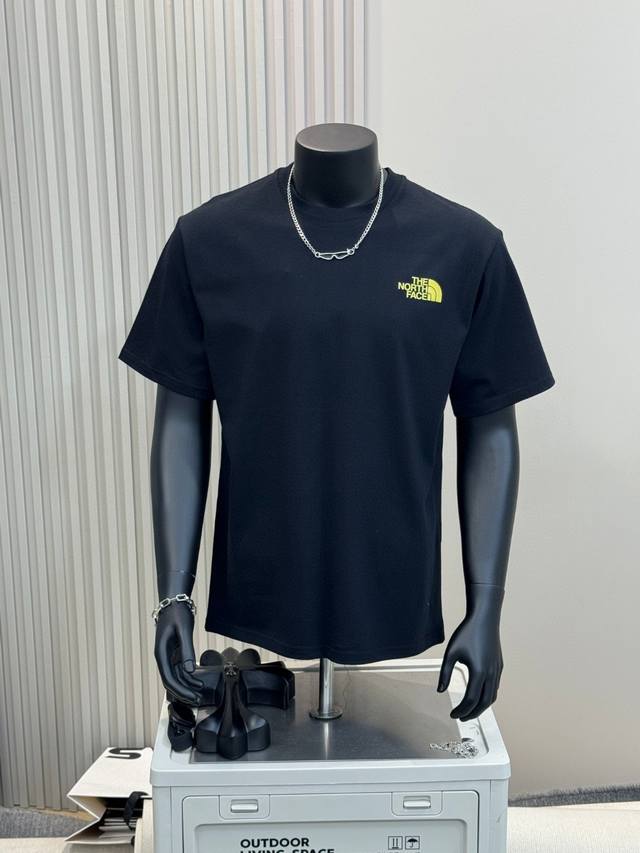 The North Face 25Ss Tnf cashew flower print on the back, round neck short-sleeve