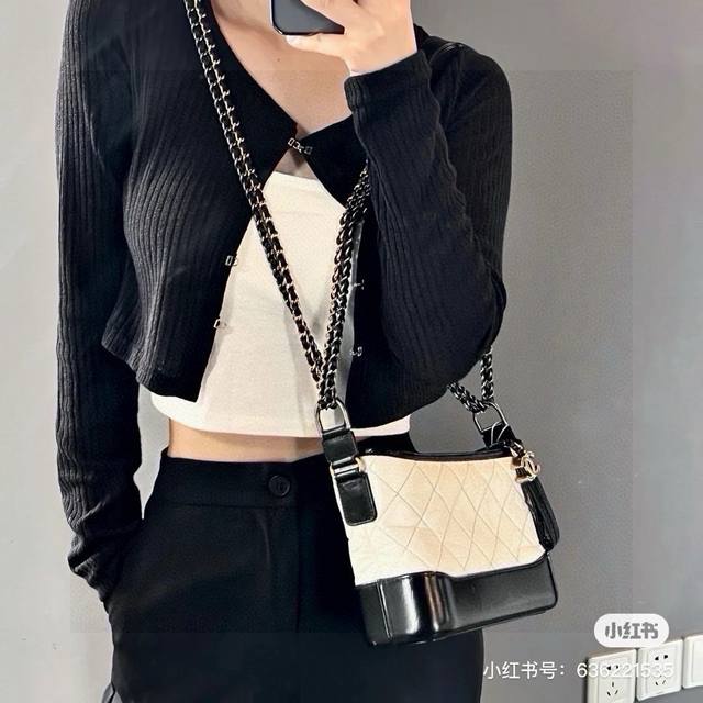 Chanel Hobo Bag White Designed by Karl Lagerfeld himself, this Chanel Hobo Bag i