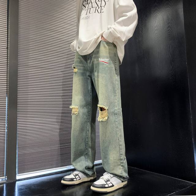 24th summer new Balenciaga Balengia ripped retro workwear washed straight jeans.