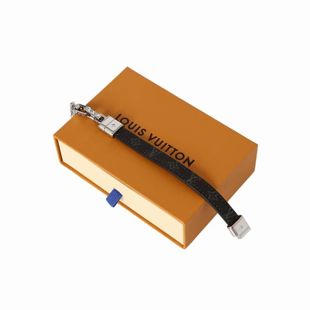Louis Vuitton bamboo engraved logo metal leather bracelet for men in black and g