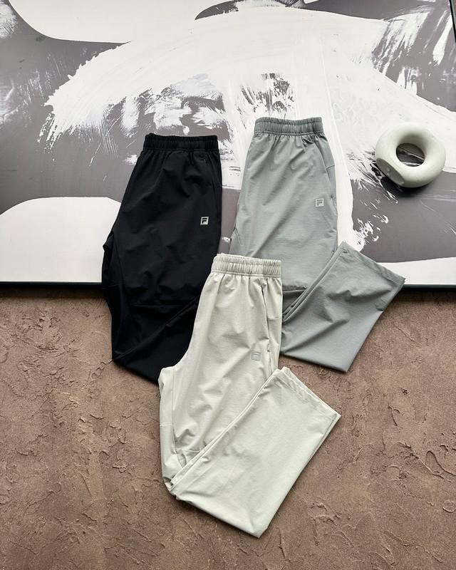 New arrival Fila official men's woven trousers 2025 summer new simple basic outd