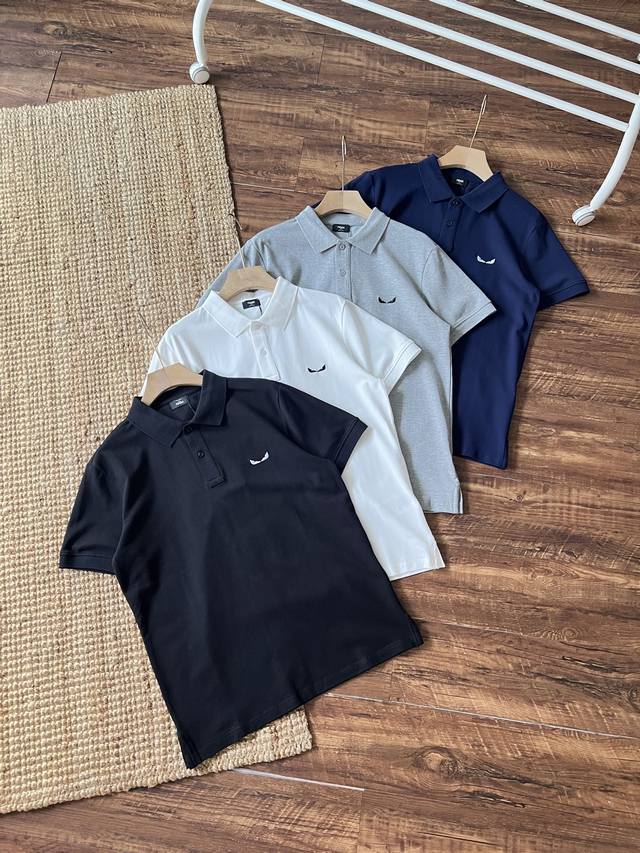 Fendi's Little Devil Embroidered Cotton Lapel Short-Sleeved Polo is centered on
