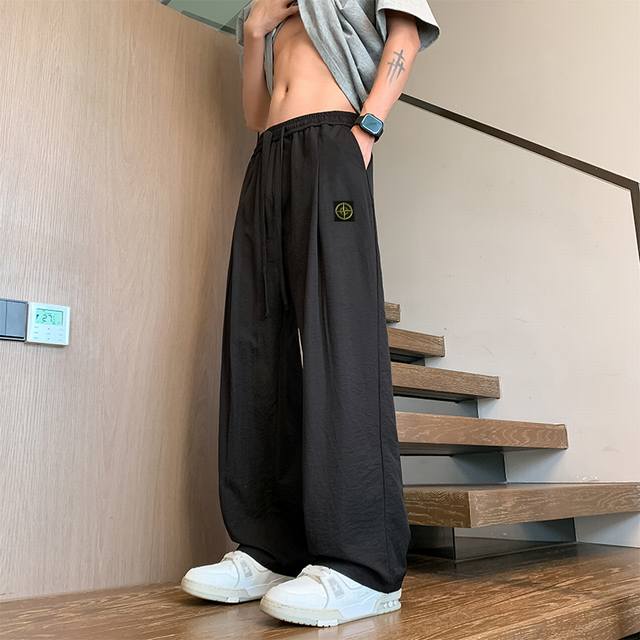 Stone Island new summer solid color casual ice silk pants, versatile mopping pan
