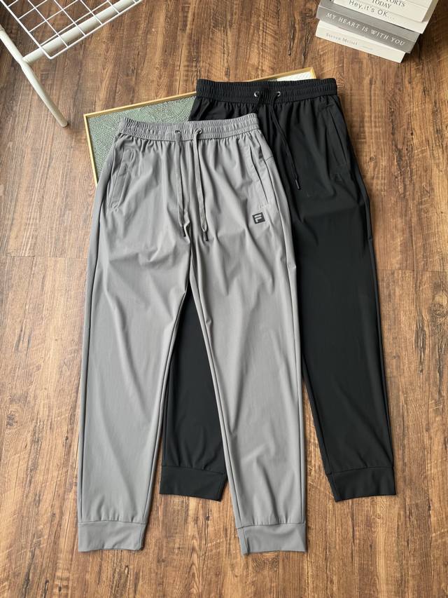 Summer Fila Men's Casual Sports Quick-Drying Pants are the perfect combination o
