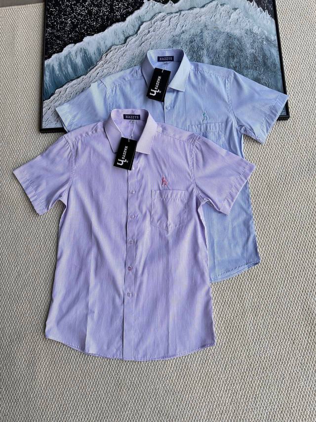 Hazzys striped short-sleeved lapel shirt, a classic and trendy choice for urban