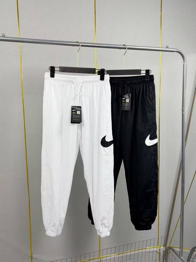 Nike: 2015 Nike side hook women's pants woven breathable training sports casual