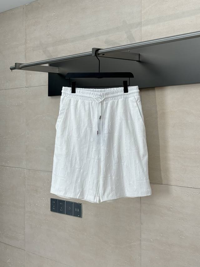 Dio* Dior Oblique Shorts Made from navy blue cotton jersey, it features an all-o