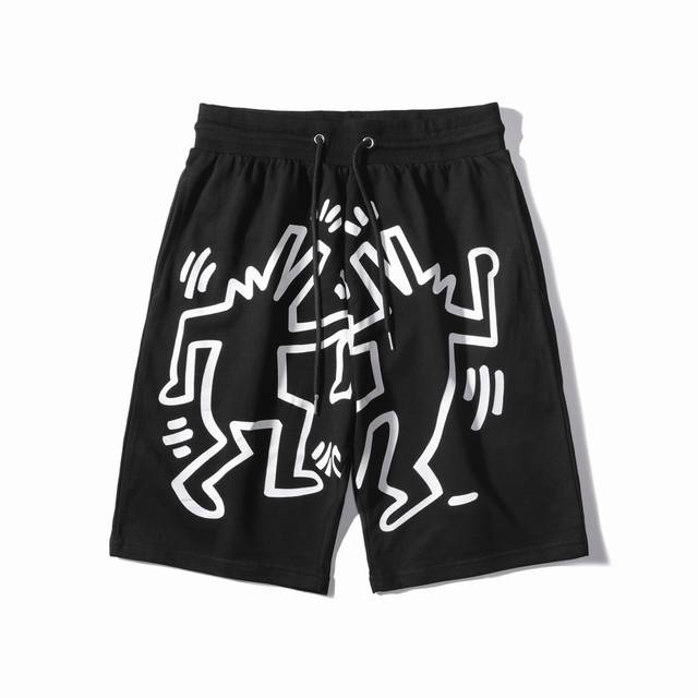 New style casual shorts with large M graffiti print, terry sweater material, bla