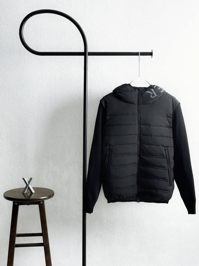 Model No. Xb0145 Moreclear hooded down jacket with label on chest The fabric is