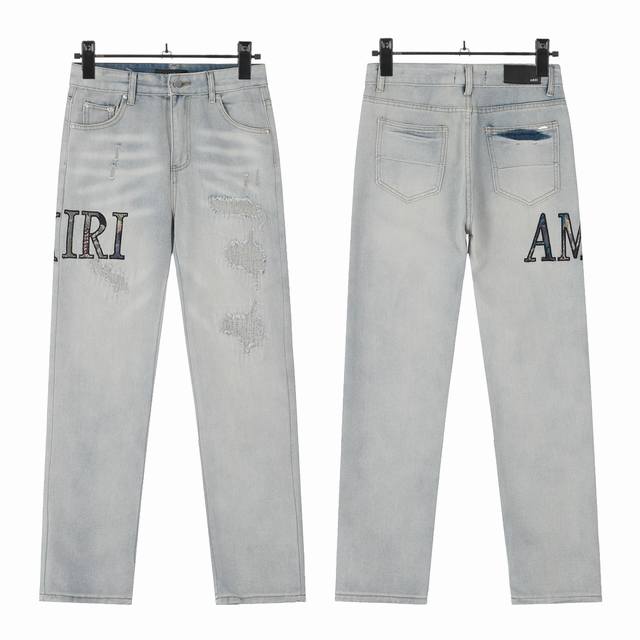 W46 Amiri classic embroidered ripped patch washed lightning pattern skinny jeans