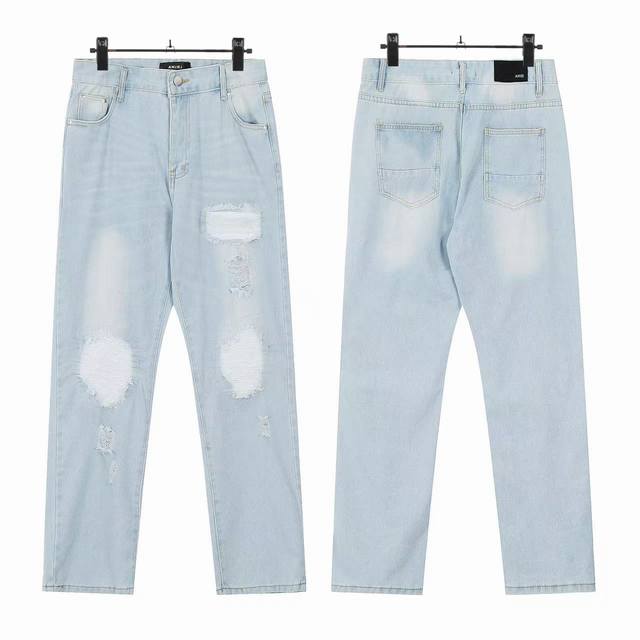W45 Amiri classic embroidered ripped patch washed lightning pattern skinny jeans