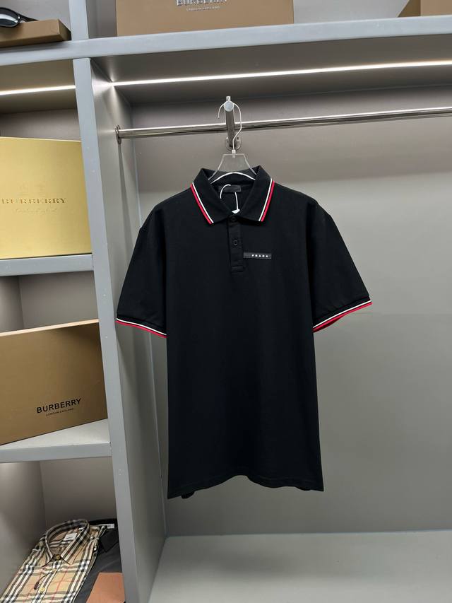 Prada new Polo shirt with Prada logo and letter strips Original fabric, official