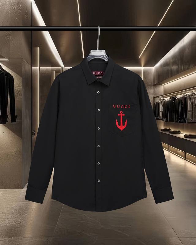 Gucci hits the market. Classic long-sleeved shirt with anchor logo and letter em