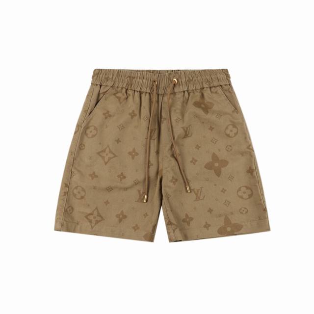 Louis Vuitton shorts with dark pattern and monogram print The fabric is made of