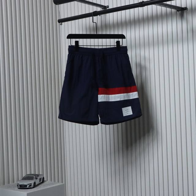Thom Browne 25Ss red, white and blue ribbon beach shorts The fabric is custom-ma