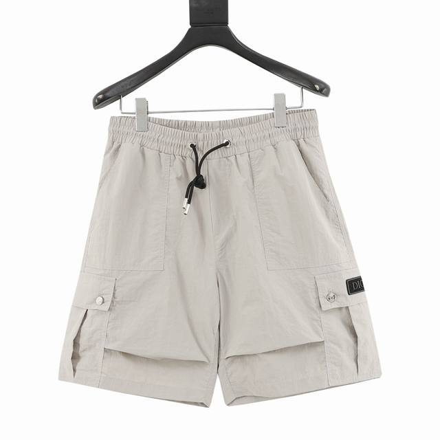 Dior workwear pocket logo shorts The fabric is made of custom woven fabric, whic