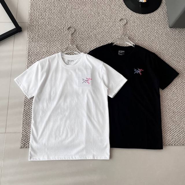 Flat lay Arc'teryx Kragg Cotton gradient color big logo short sleeve, unlocking