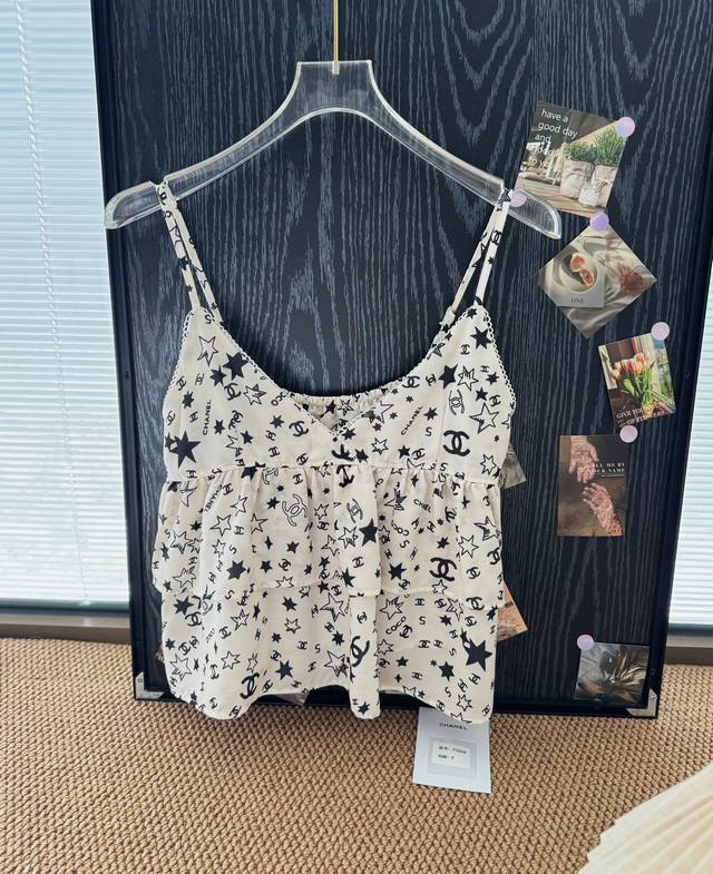 Product name: Chane* Chanel Lucky Star Sexy Camisole Size: F Color: White Lucky