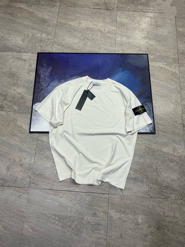 Flat lay Stone Island wide-cut drop shoulder candy-colored T-shirt outdoor quick