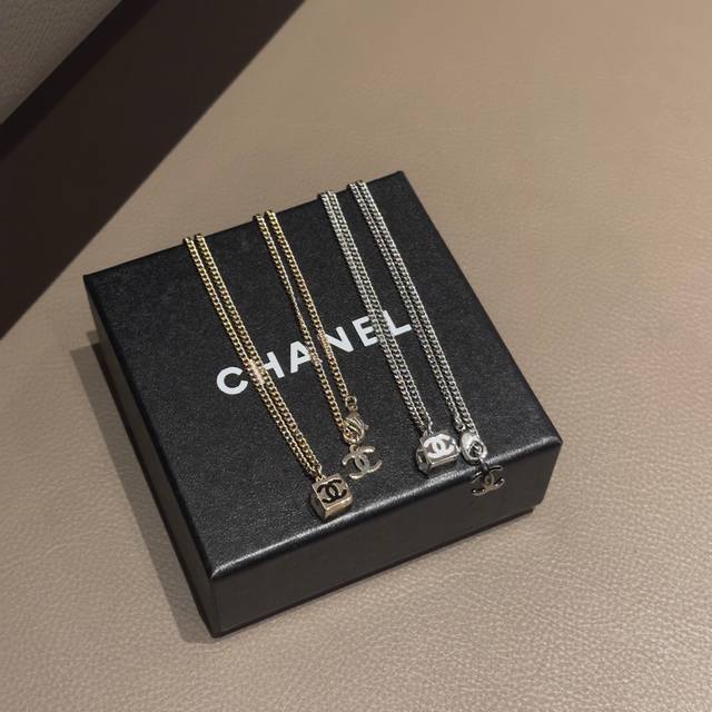Chanel 25C small square necklace, looks good on everyone, the small dice are so