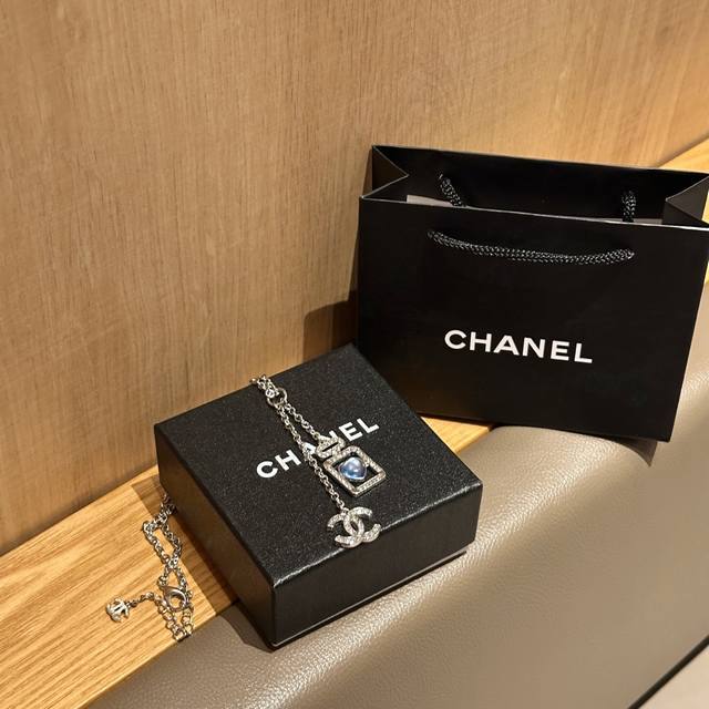 Chanel's new blue perfume bottle necklace, so cute, the little blue heart in the