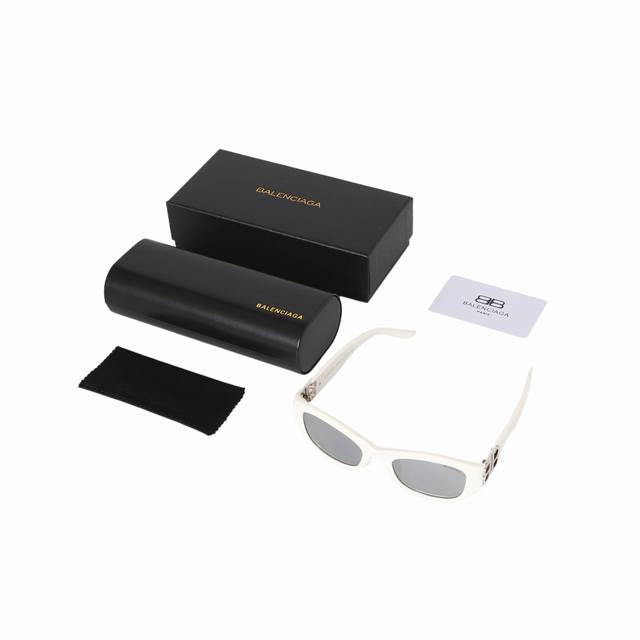 Balenciaga sunglasses with double B logo on temples, irregular shape, unisex, co