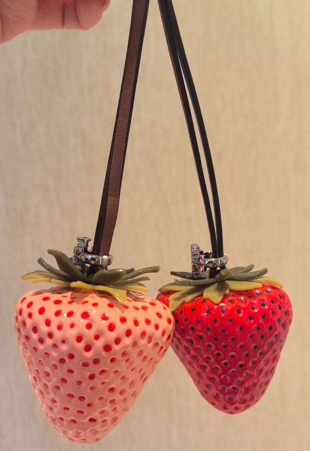 Tb's new strawberry cute bag! Is this going for the cute route? Who wouldn't wan