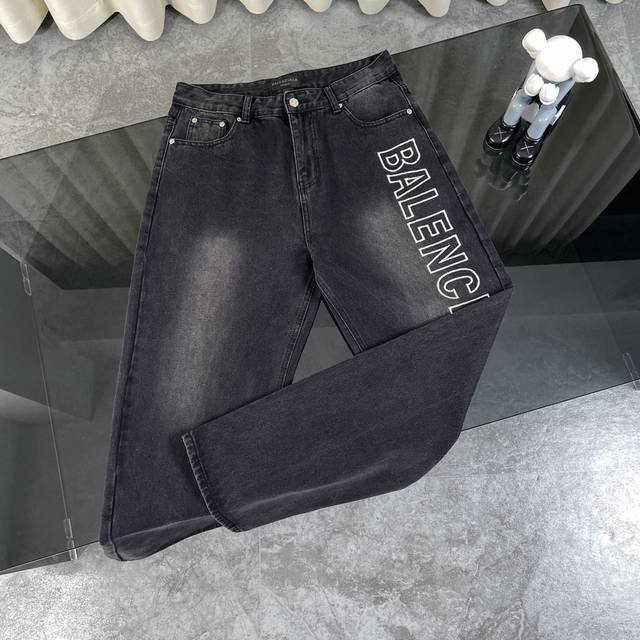 Balenciaga's new single-breasted couple jeans with logo embroidery on the side.