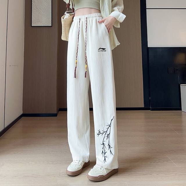 China Li Ning - Lining summer new pure color ice silk pants, men and women's cas